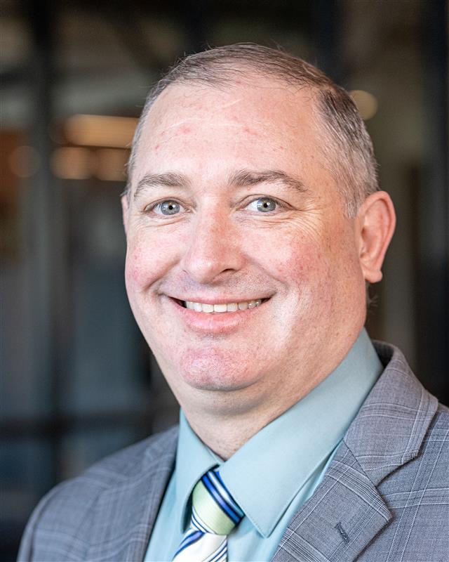 Scott Fitzpatrick in a suit