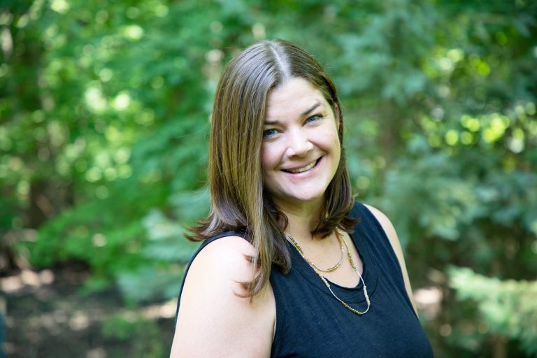 Woman with straight hair smiling