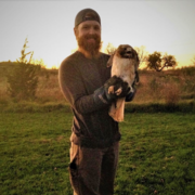 Steve Gurney handling a raptor